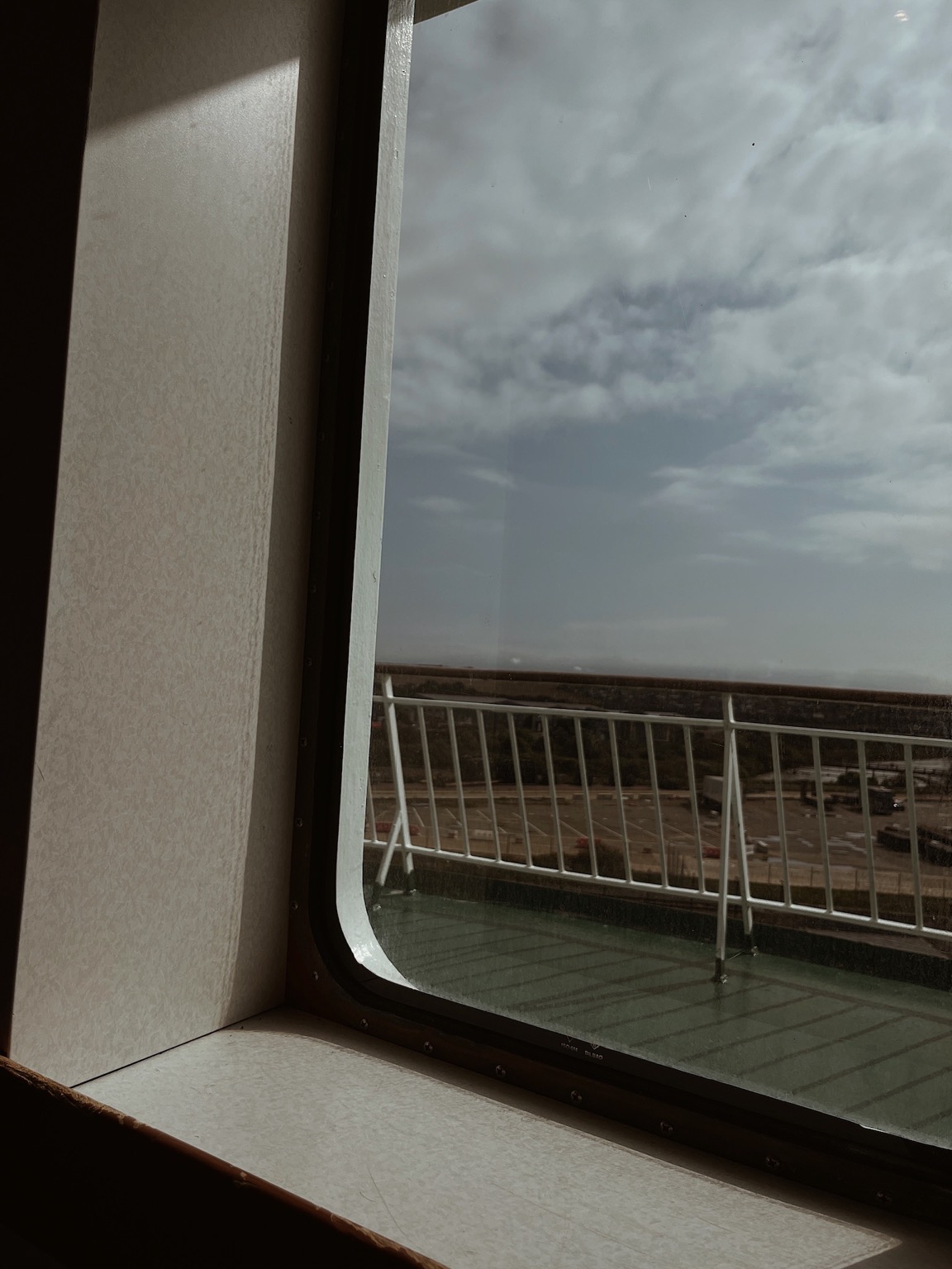 Close-up photography of a ferry window between Newhaven and Dieppe. Smooth lighting and soft shadows.